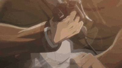 A Close Up Of A Person Holding A Gun In Their Hands . GIF