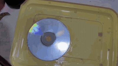 A Close Up Of A Person Holding A Piece Of Paper That Says ' 3M ' On It GIF