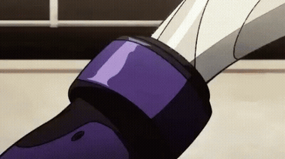 A Close Up Of A Person Holding A Sword With A Purple And Black Strap . GIF
