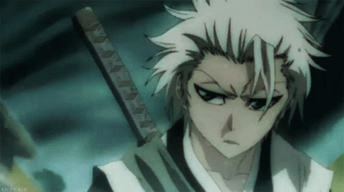 A Close Up Of A Person Holding A Sword With The Word Anime Fair On The Bottom GIF
