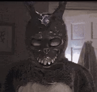 A Close Up Of A Person In A Bunny Costume With A Light Coming Out Of His Eyes . GIF