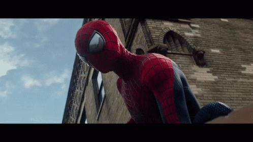 A Close Up Of A Person In A Spider Man Suit GIF