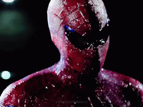 A Close Up Of A Person In A Spiderman Costume With A Black Background . GIF