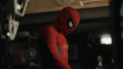 A Close Up Of A Person In A Spiderman Suit GIF