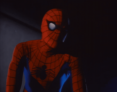 A Close Up Of A Person In A Spiderman Suit GIF