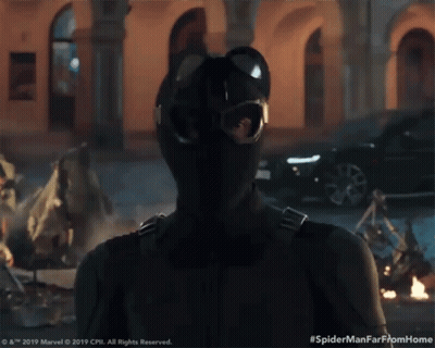 A Close Up Of A Person In A Spiderman Suit GIF