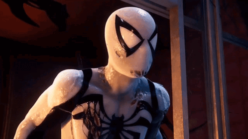 A Close Up Of A Person In A White Spiderman Costume GIF