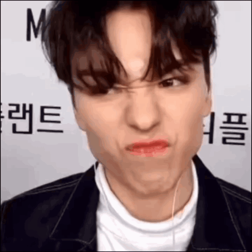 A Close Up Of A Person Making A Funny Face GIF