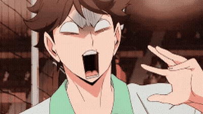 A Close Up Of A Person Making A Funny Face With Their Hand . GIF