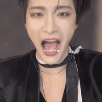A Close Up Of A Person Making A Funny Face With Their Tongue Out . GIF