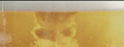 A Close Up Of A Person Opening A Bottle Of Beer With A Red Arrow On The Cap . GIF