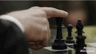 A Close Up Of A Person Playing A Game Of Chess With # Billions Showtime GIF