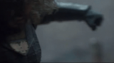 A Close Up Of A Person 'S Arm And Leg In A Dark Room . GIF