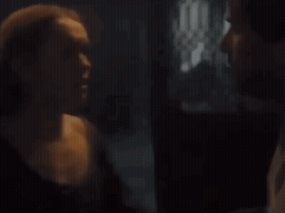 A Close Up Of A Person 'S Arm In A Dark Room With A Black Background . GIF