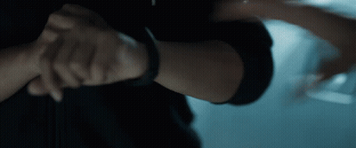 A Close Up Of A Person 'S Arm With A Black Watch On It GIF