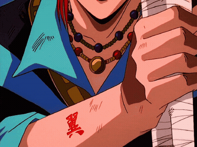 A Close Up Of A Person 'S Arm With Chinese Characters On It GIF
