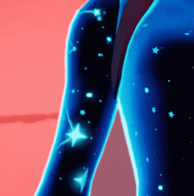 A Close Up Of A Person 'S Arm With Glowing Stars GIF