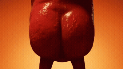 A Close Up Of A Person 'S Butt Against An Orange Background . GIF
