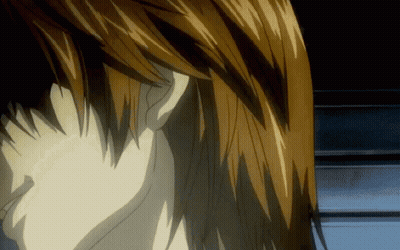 A Close Up Of A Person 'S Ear With A Black Background GIF