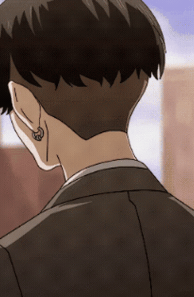 A Close Up Of A Person 'S Ear With A Piercing GIF