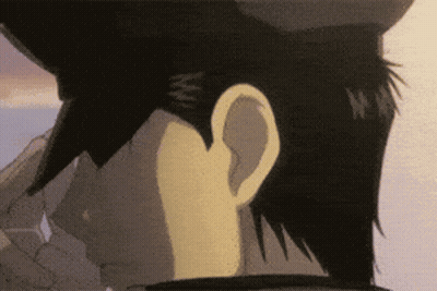 A Close Up Of A Person 'S Ear With The Letters M And W On It GIF