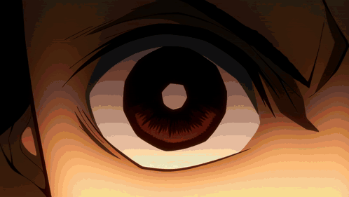 A Close Up Of A Person 'S Eye With A Dark Center GIF