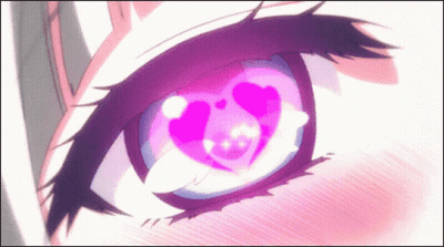 A Close Up Of A Person 'S Eye With A Heart In It . GIF