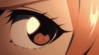 A Close Up Of A Person 'S Eye With A Light Coming Out Of It GIF