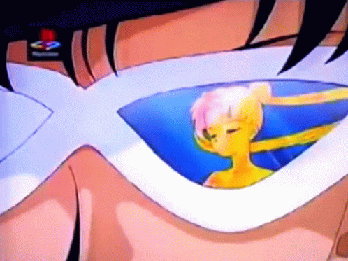 A Close Up Of A Person 'S Eye With A Playstation Logo GIF