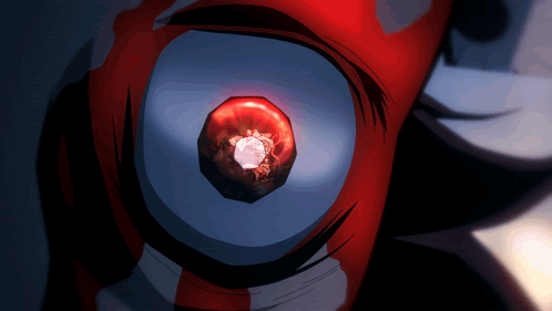 A Close Up Of A Person 'S Eye With A Red Glowing Object In It GIF