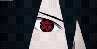 A Close Up Of A Person 'S Eye With A Red Star In The Middle GIF