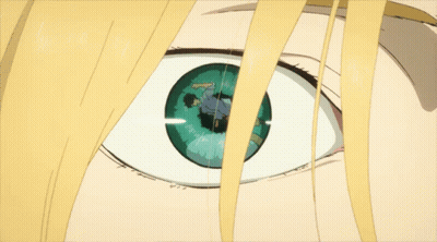 A Close Up Of A Person 'S Eye With A Reflection Of A Man In It GIF