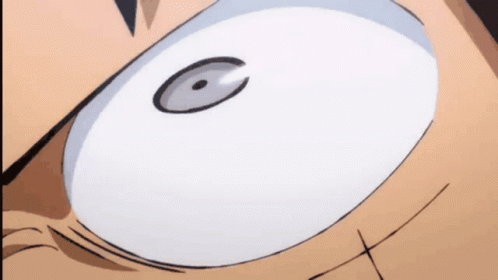 A Close Up Of A Person 'S Eye With A White Pupil GIF