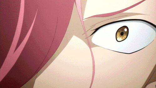 A Close Up Of A Person 'S Eye With A White Pupil GIF