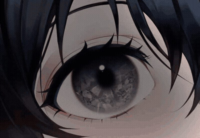 A Close Up Of A Person 'S Eye With Long Black Hair GIF