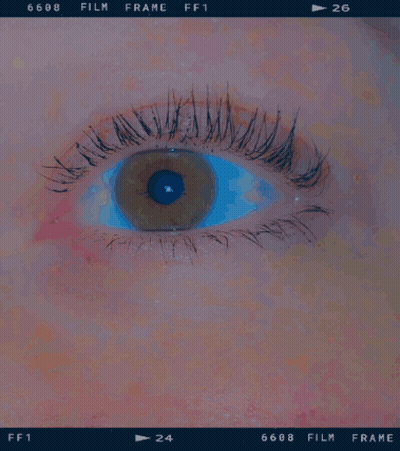 A Close Up Of A Person 'S Eye With The Number 6688 Film Frame On The Bottom GIF