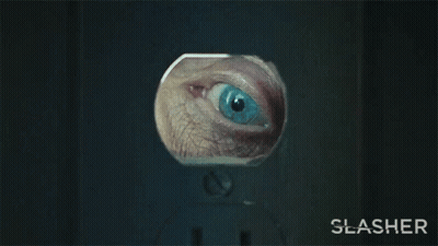 A Close Up Of A Person 'S Eye With The Word Slasher Below GIF