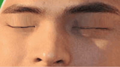 A Close Up Of A Person 'S Eye With Their Eyes Closed GIF