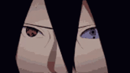 A Close Up Of A Person 'S Eyes In A Dark Room GIF