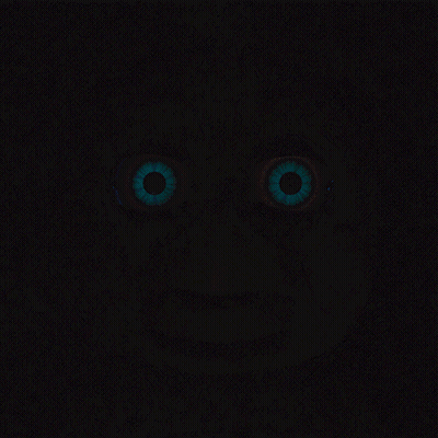A Close Up Of A Person 'S Eyes That Are Glowing GIF