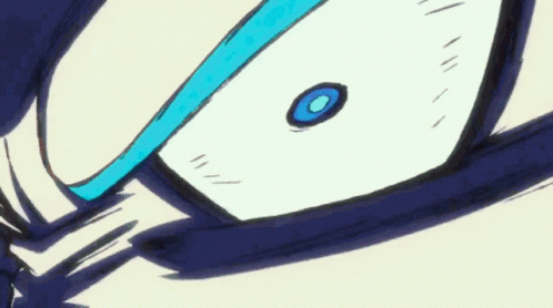 A Close Up Of A Person 'S Eyes With A Blue Circle In The Center . GIF