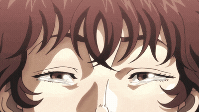 a close up of a person 's eyes with a tear coming out of them