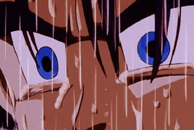 A Close Up Of A Person 'S Eyes With Blue Eyes And Sweat Coming Out Of Them GIF