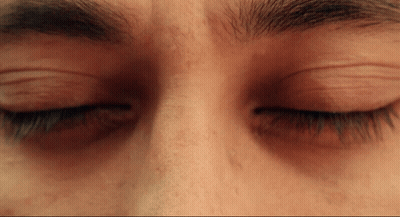 A Close Up Of A Person 'S Eyes With Their Eyelashes Closed GIF