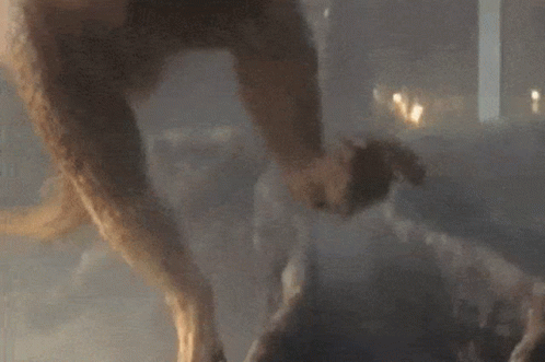 A Close Up Of A Person 'S Face And Neck GIF