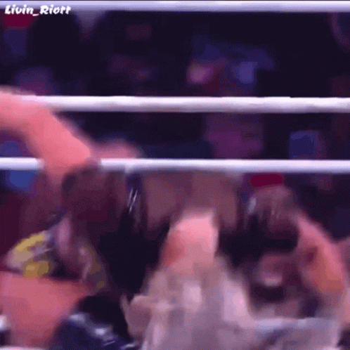 A Close Up Of A Person 'S Face In A Boxing Ring GIF