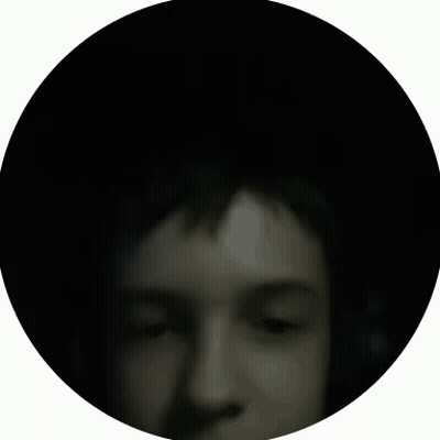 A Close Up Of A Person 'S Face In A Circle GIF