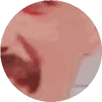 A Close Up Of A Person 'S Face In A Circle Sticker