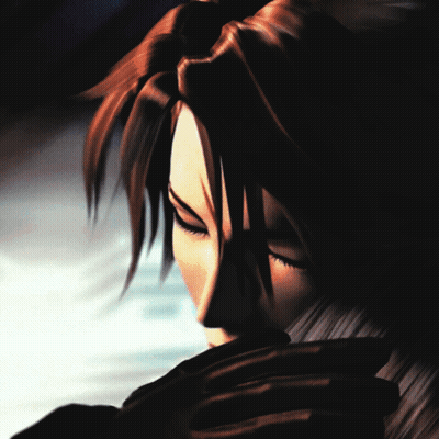 A Close Up Of A Person 'S Face In A Dark Room GIF