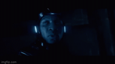 A Close Up Of A Person 'S Face In A Dark Room With The Words Imgflip.com At The Bottom GIF
